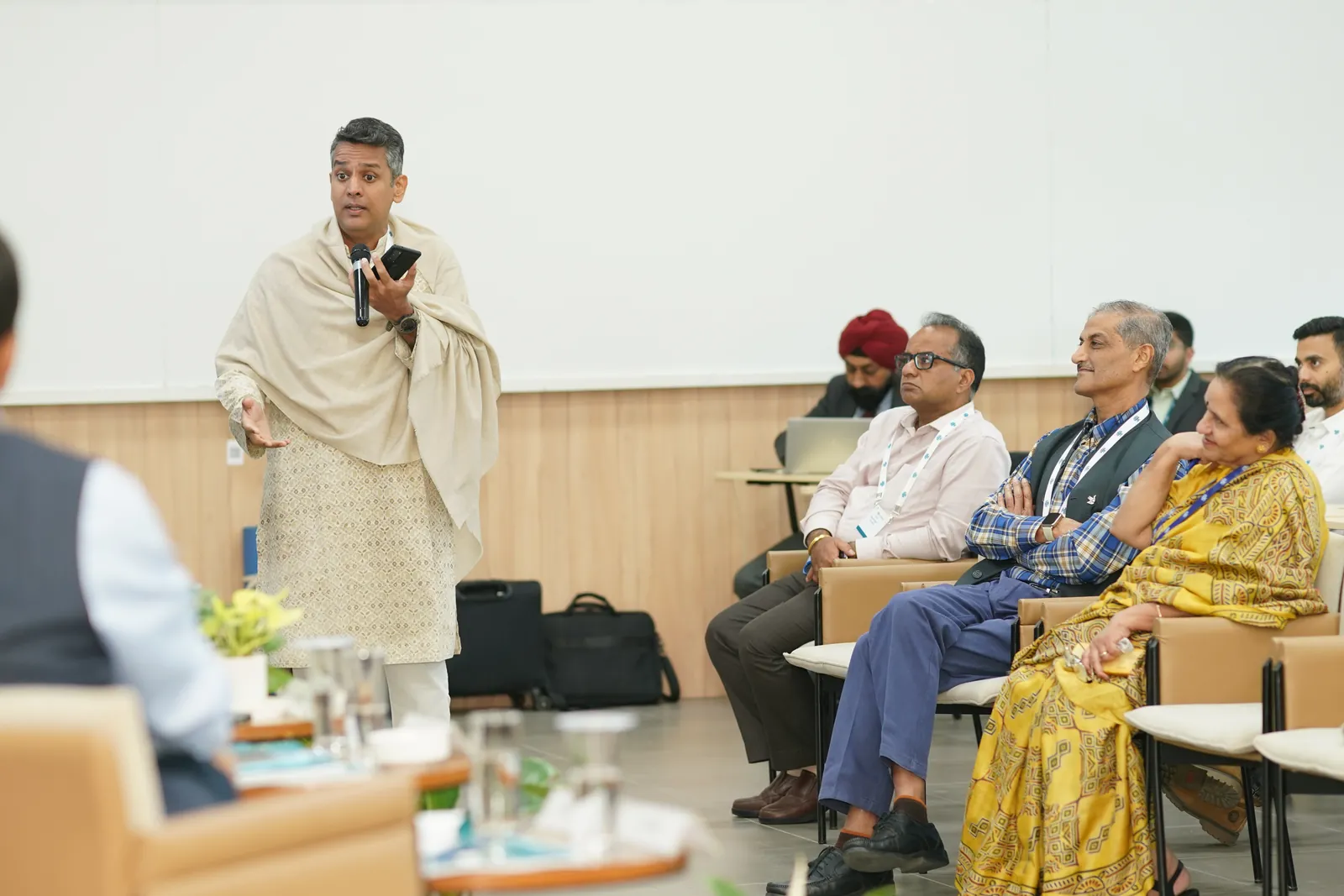 A speaker taking questions from the audience