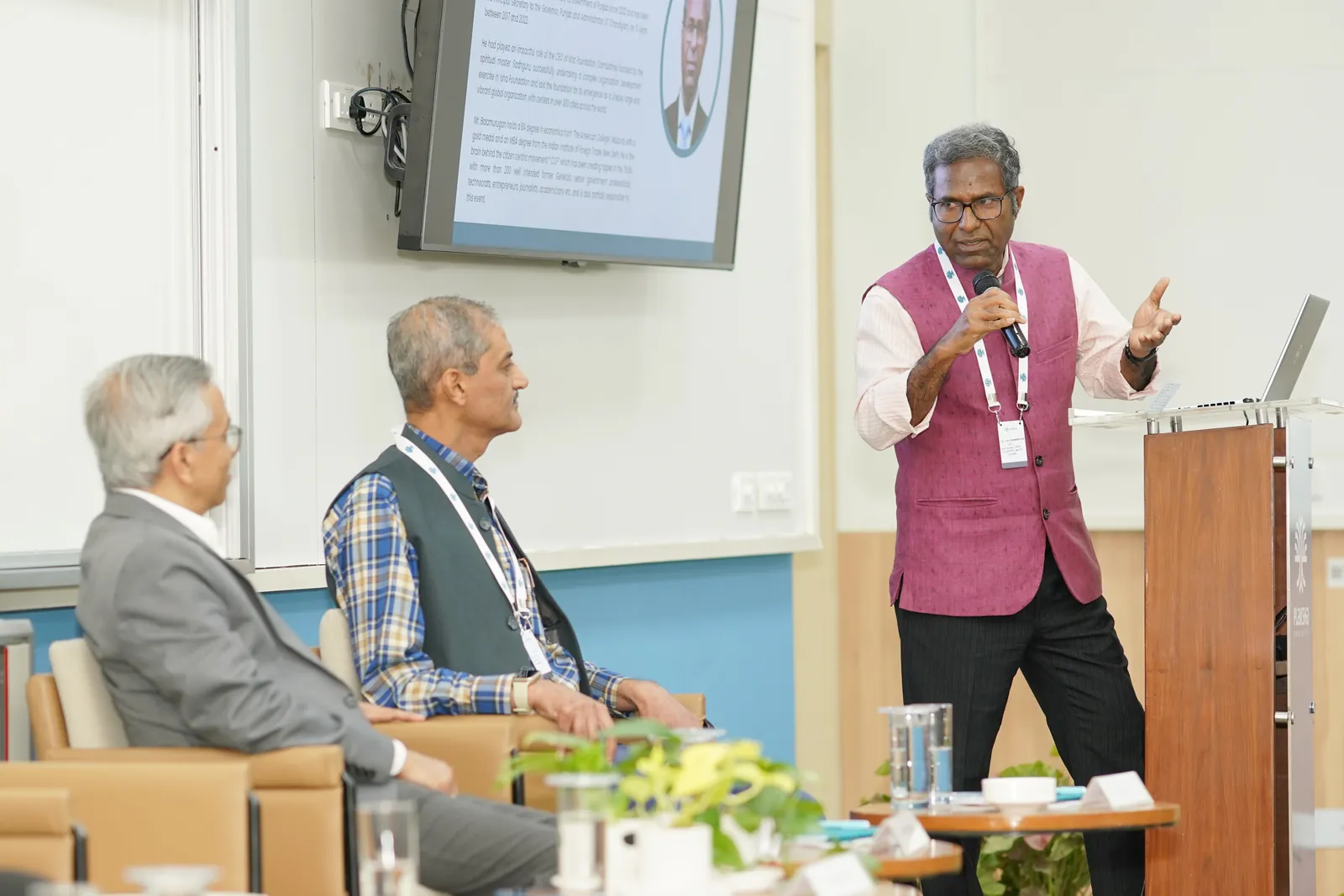 A speaker addressing the conference