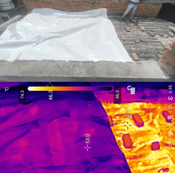 Thermal image of a roof partly covered by the reflective sheet